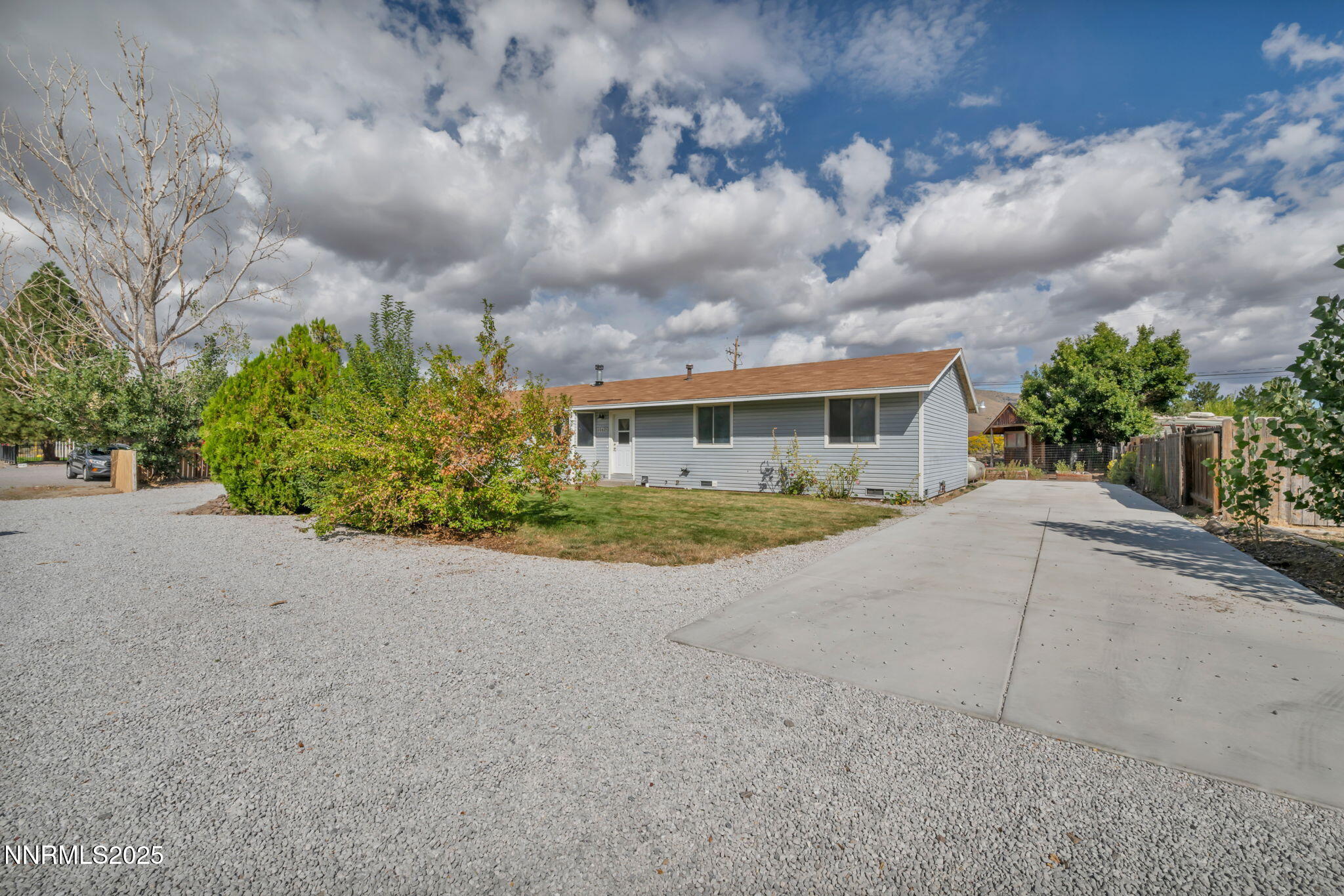 17475 Egret Lane Reno, NV 89508 - Photo 3 of 67 front view of house with a yard