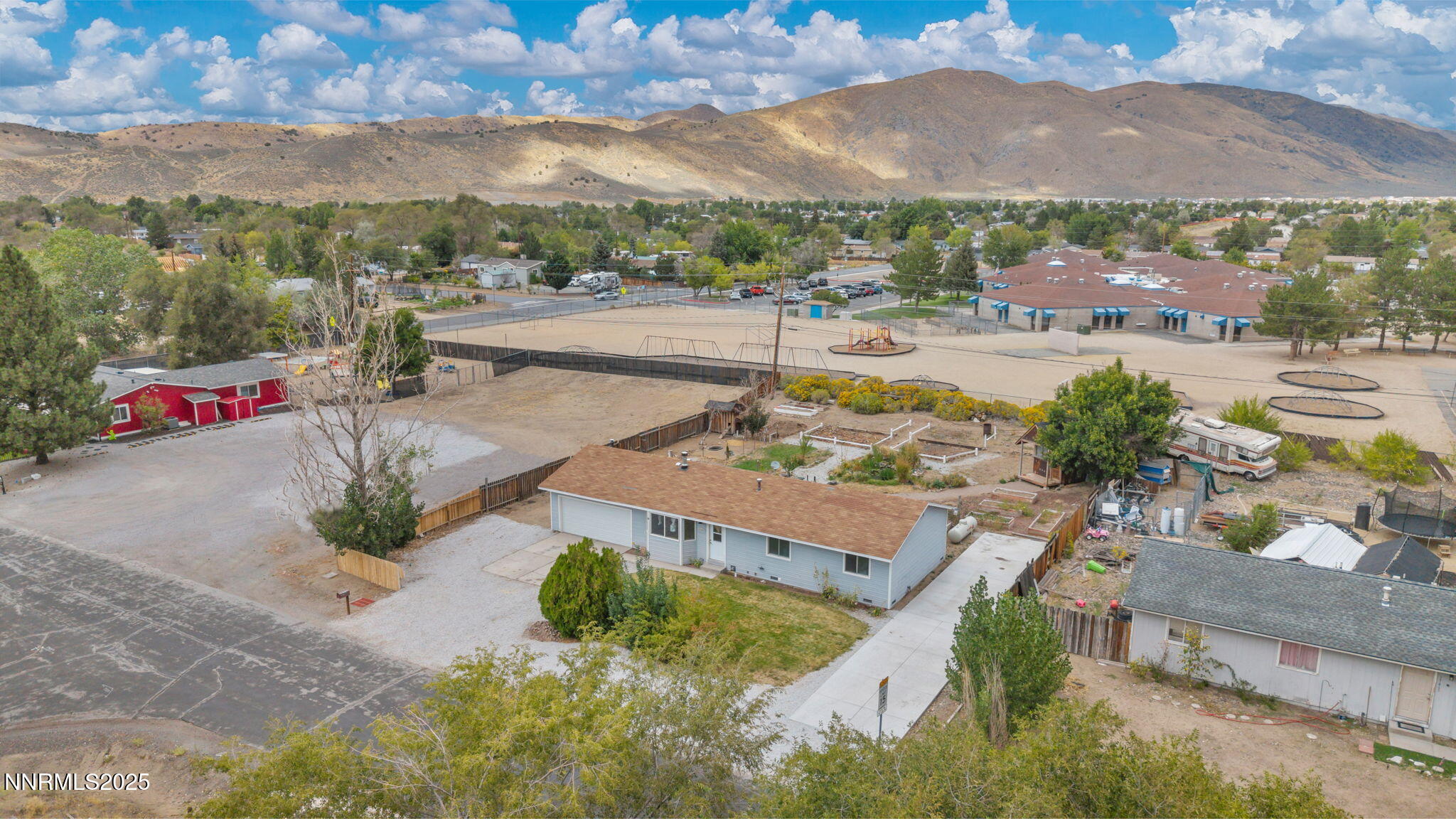 17475 Egret Lane Reno, NV 89508 - Photo 32 of 67 an aerial view of residential houses with outdoor space and street view