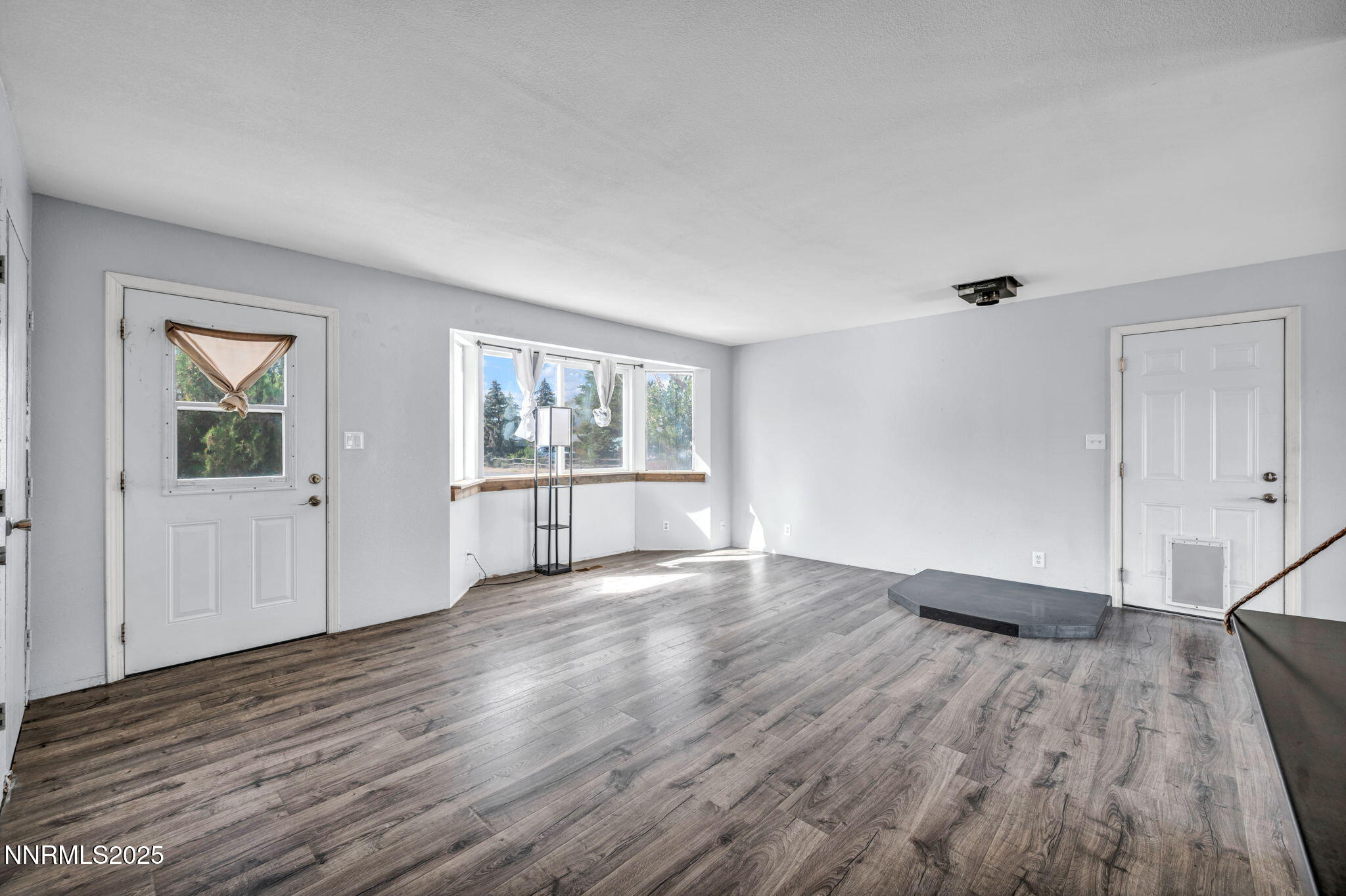 17475 Egret Lane Reno, NV 89508 - Photo 51 of 67 a view of empty room with wooden floor and fan
