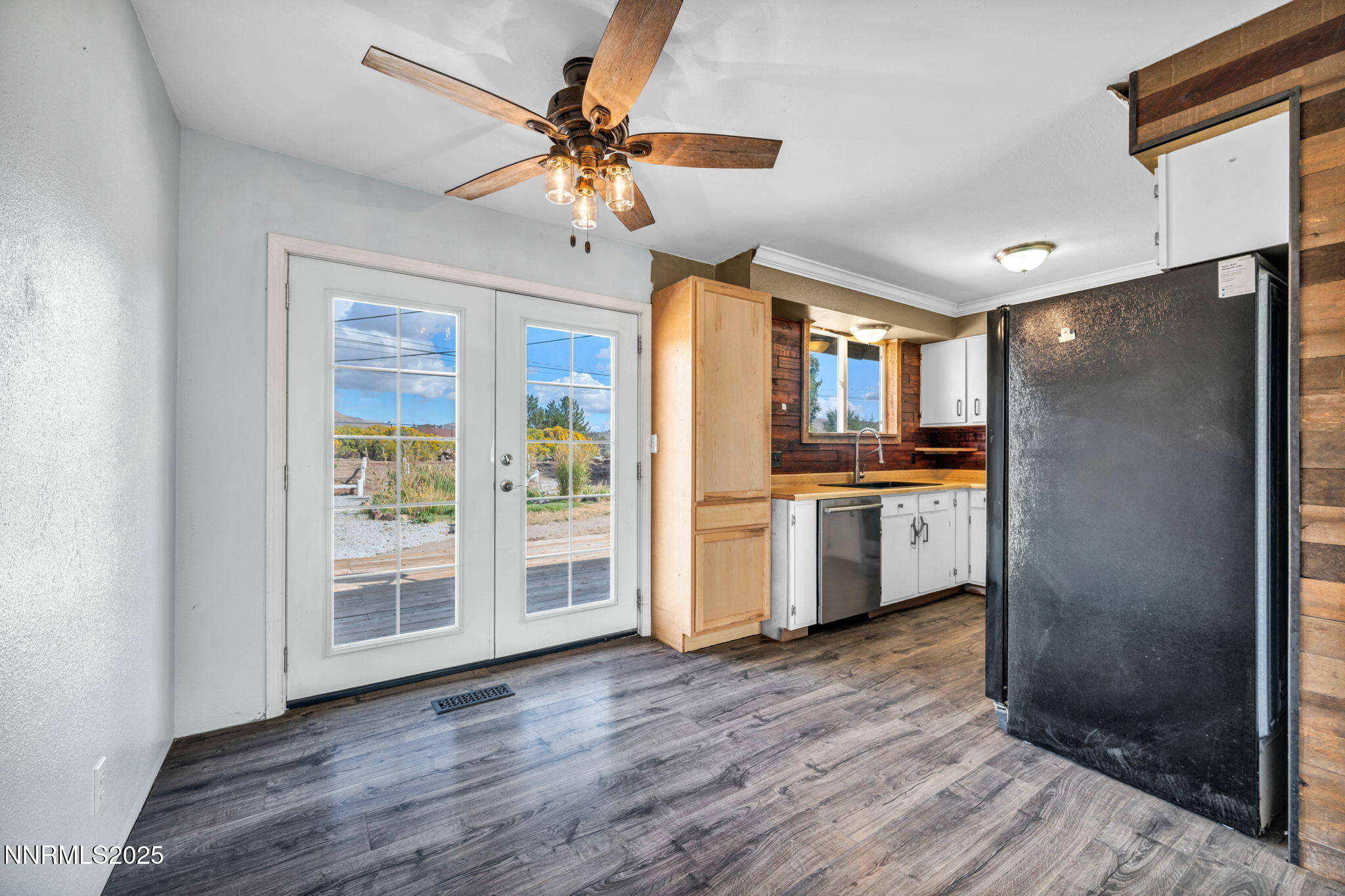 17475 Egret Lane Reno, NV 89508 - Photo 55 of 67 a kitchen with stainless steel appliances kitchen island granite countertop a refrigerator and a sink