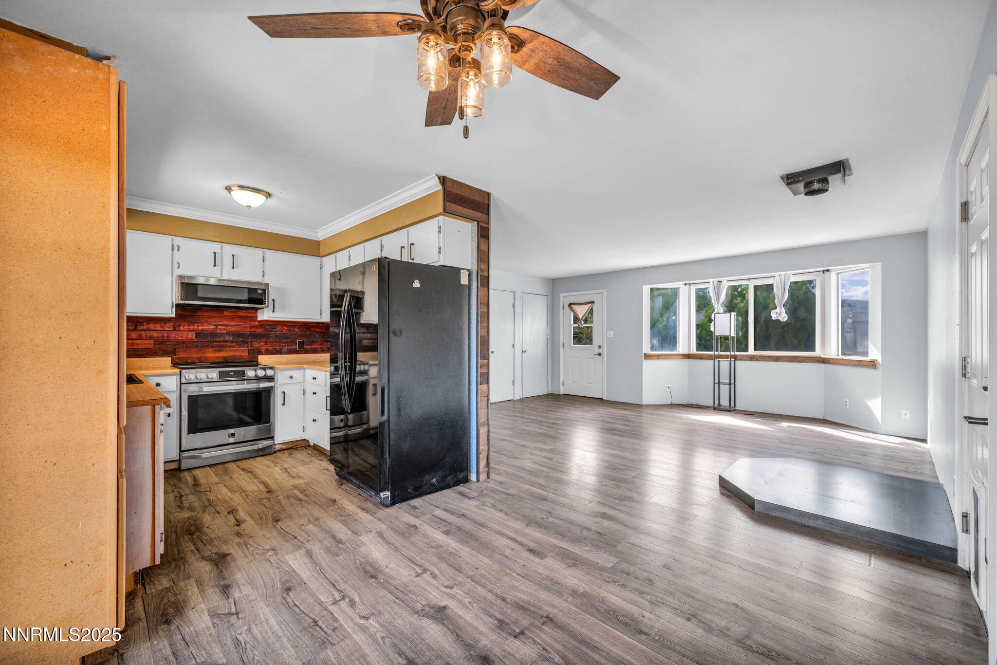 17475 Egret Lane Reno, NV 89508 - Photo 57 of 67 a view of a living room a refrigerator and a stove