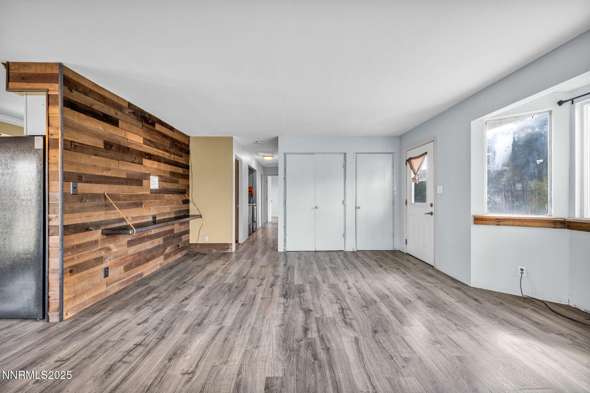 17475 Egret Lane Reno, NV 89508 - Photo 60 of 67 a view of room with wooden floor and window