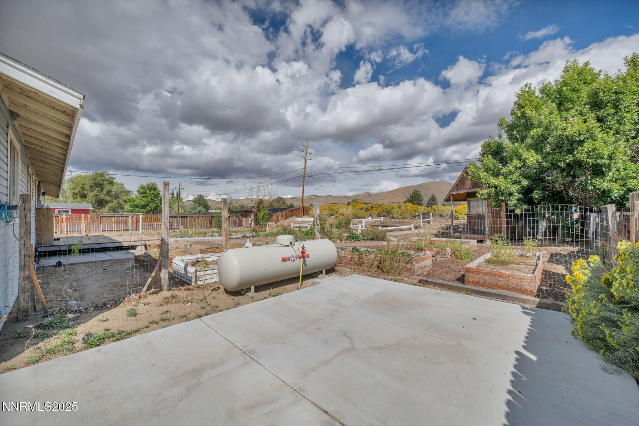 17475 Egret Lane Reno, NV 89508 - Photo 8 of 67 a view of a patio with couches and potted plants