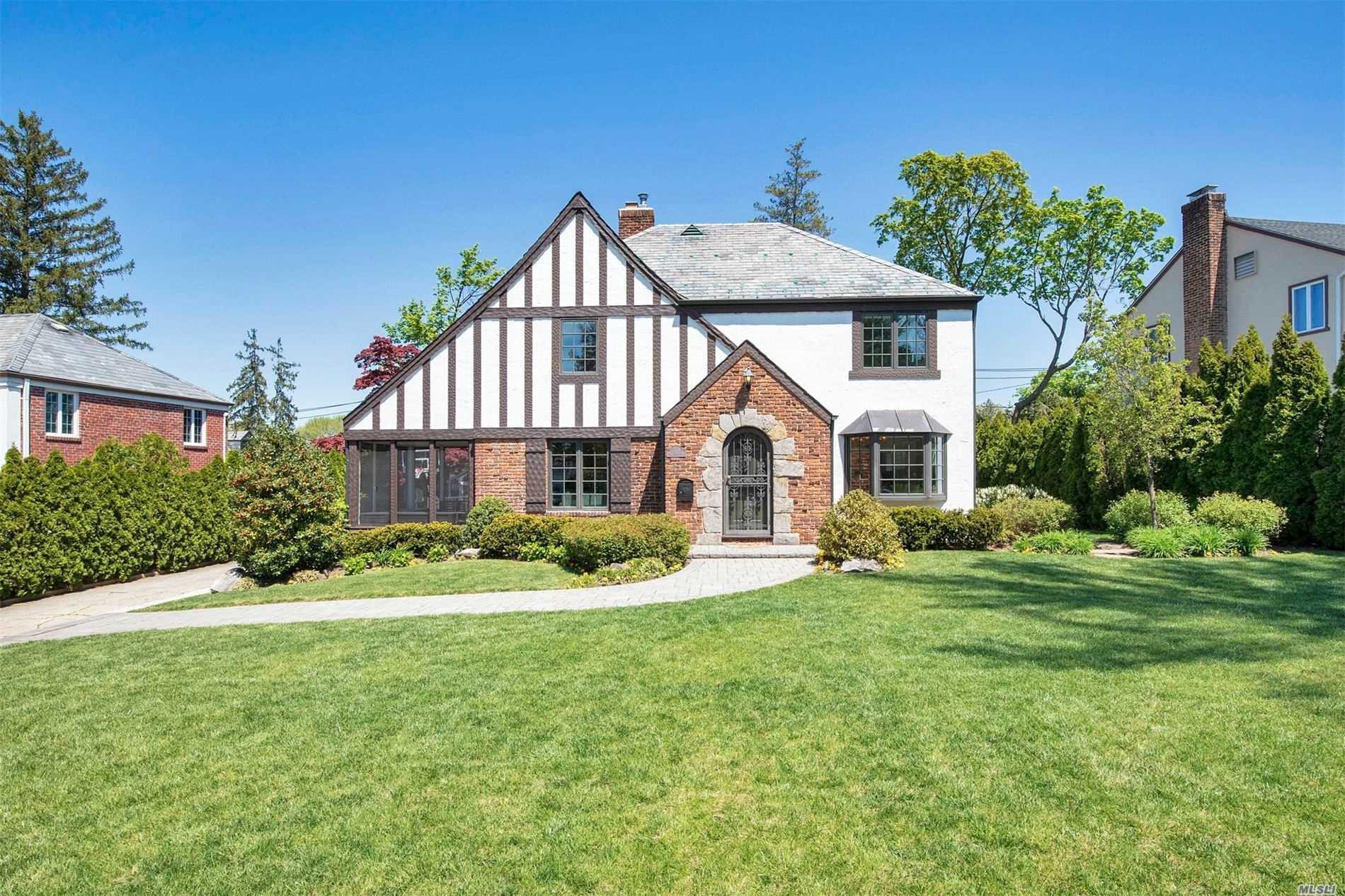 305 Mill Spring Road Manhasset, NY 11030 - Photo 1 of 1 a view of a house with a yard