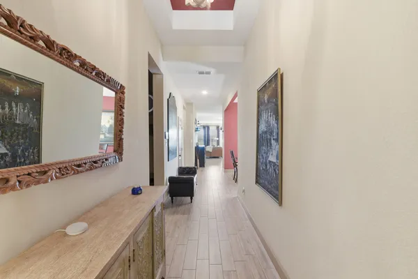 a bathroom with a sink a mirror and a shower