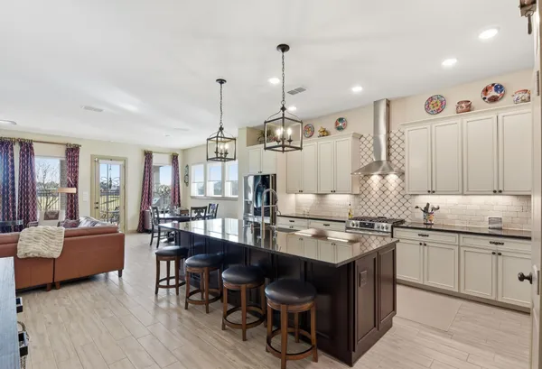 a kitchen with granite countertop lots of counter top space