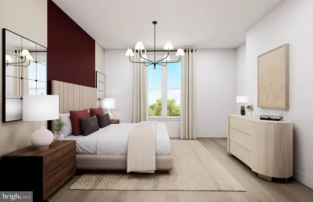 a bedroom with bed and window