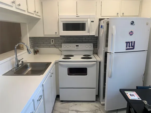 $89,999 | 9081 Lime Bay Boulevard, Unit 214, Tamarac, FL 33321