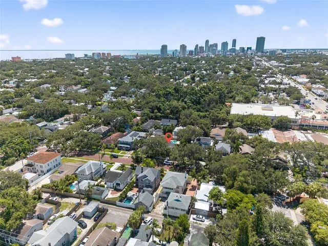 an aerial view of a city with lots of residential buildings