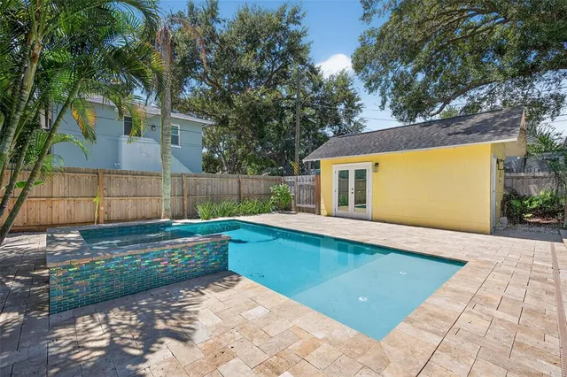 a view of outdoor space and swimming pool