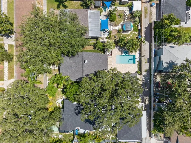 an aerial view of a house with a garden