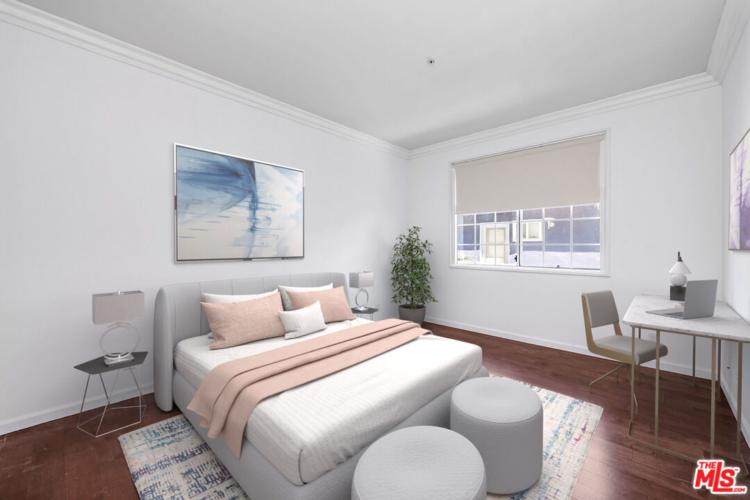 10630 Eastborne Avenue, Unit 203 Los Angeles, CA 90024 - Photo 16 of 26 a bedroom with bed and a window