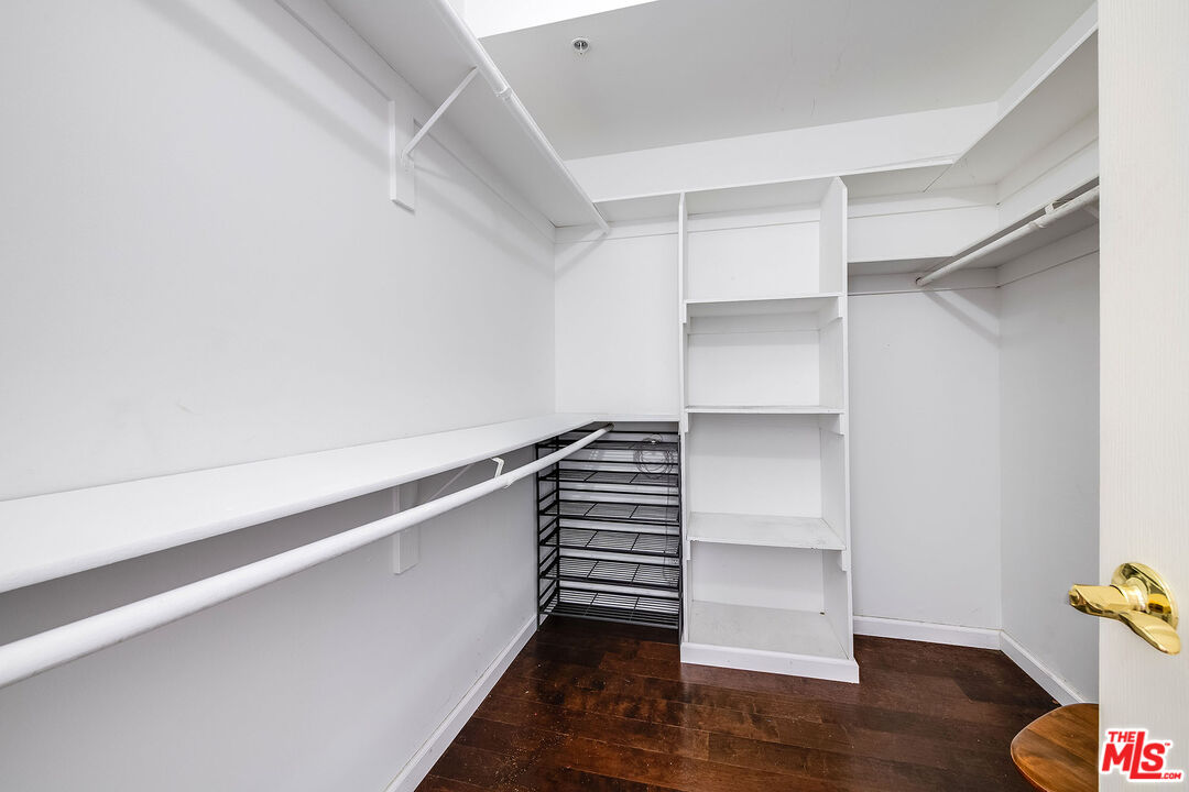 10630 Eastborne Avenue, Unit 203 Los Angeles, CA 90024 - Photo 22 of 26 a view of walk in closet with empty racks
