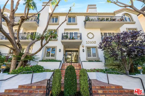 a front view of a multi story residential apartment building