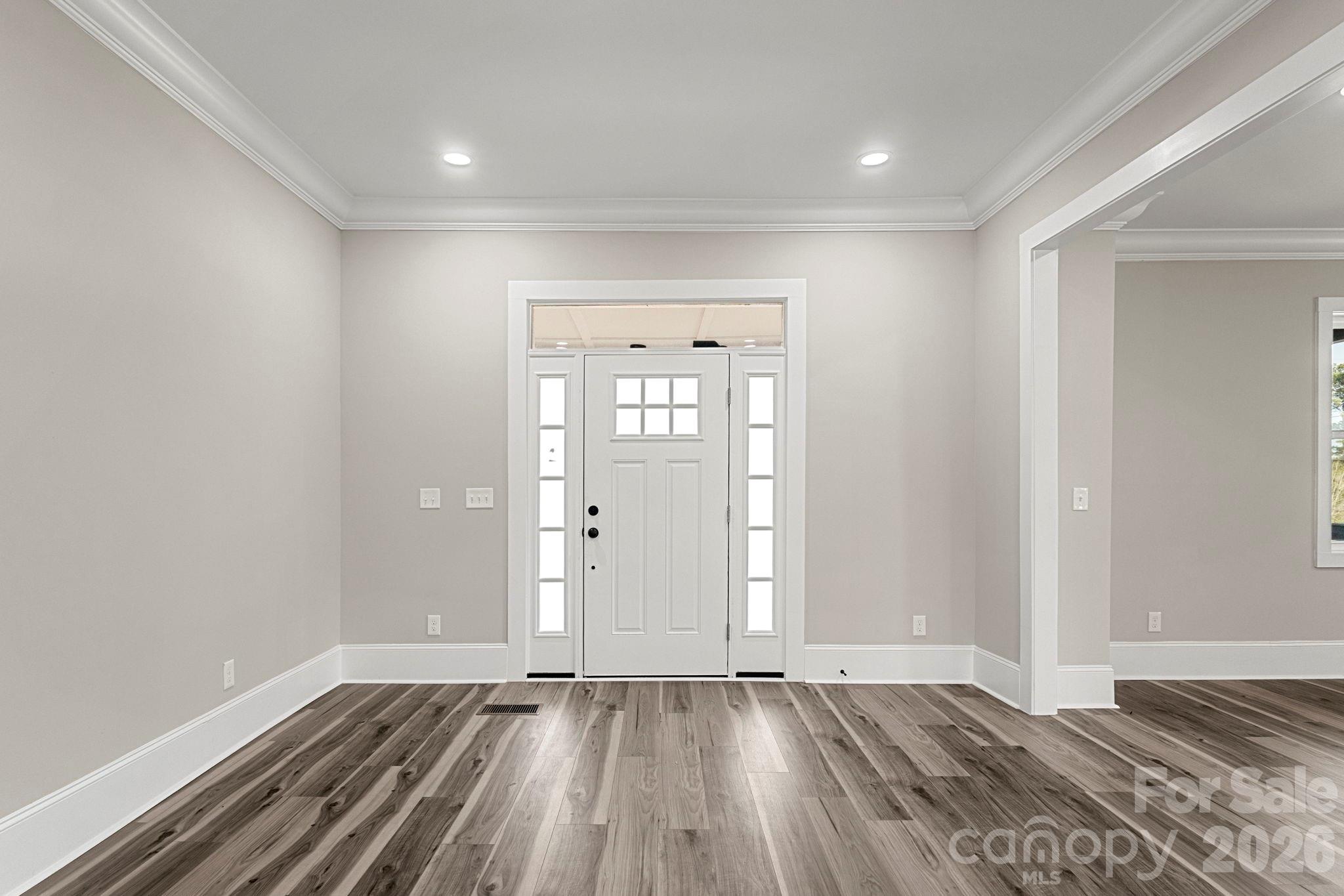 918 North New Hope Road Gastonia, NC 28054 - Photo 7 of 37 a view of an empty room and wooden floor