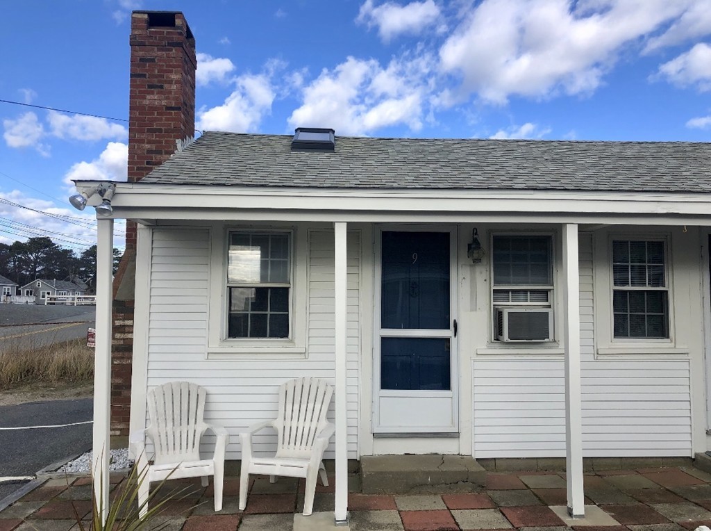 110 Glendon Road, Unit 9 Dennis, MA 02639 - Photo 1 of 22 a house view with a garden space