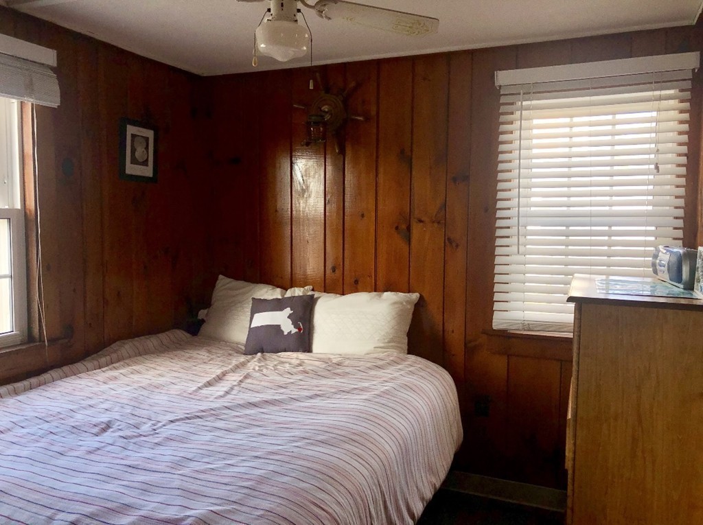 110 Glendon Road, Unit 9 Dennis, MA 02639 - Photo 11 of 22 a bedroom with a bed and a window