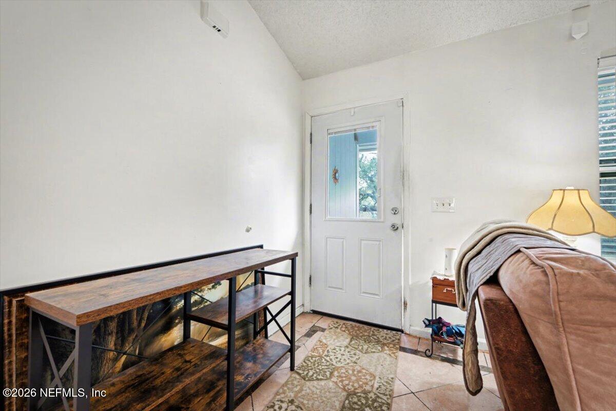 53 Lion Street Middleburg, FL 32068 - Photo 2 of 28 a view of a room with gym equipment