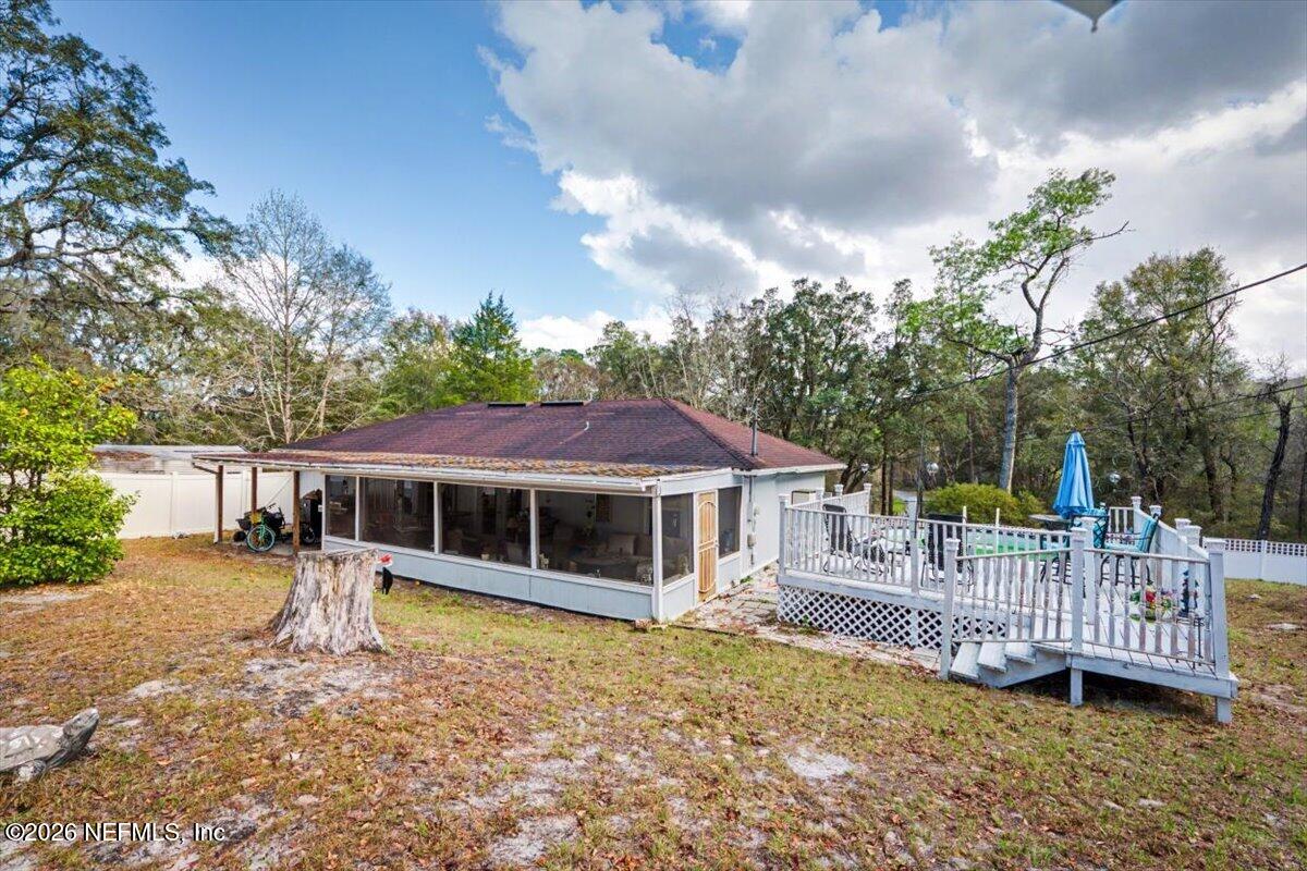 53 Lion Street Middleburg, FL 32068 - Photo 23 of 28 a house with swimming pool in front of it
