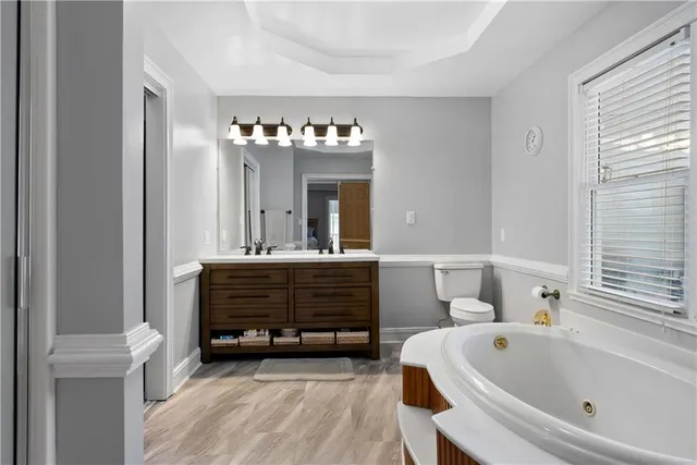 a bathroom with a bathtub and a sink