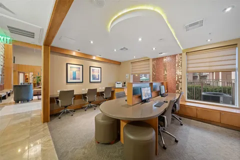 a view of a balcony with wooden floor and city view