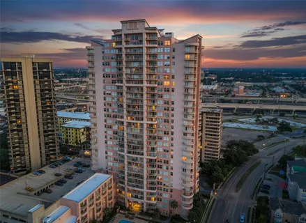 a view of a city from a balcony with city view