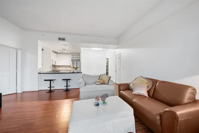 a view of a swimming pool with outdoor seating