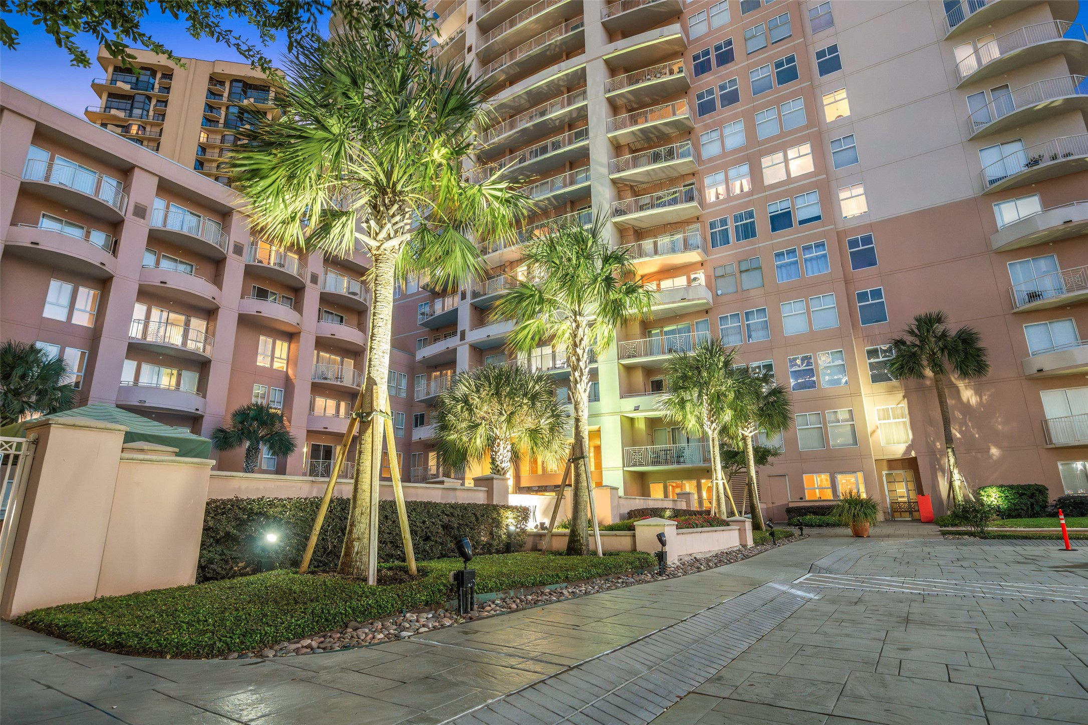 3505 Sage Road, Unit 1705 Houston, TX 77056 - Photo 32 of 38 a front view of a building with a yard