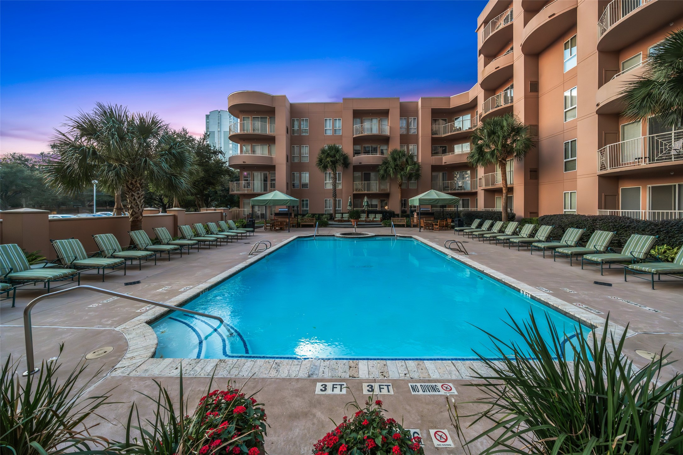 3505 Sage Road, Unit 1705 Houston, TX 77056 - Photo 6 of 38 a view of swimming pool with outdoor seating and plants