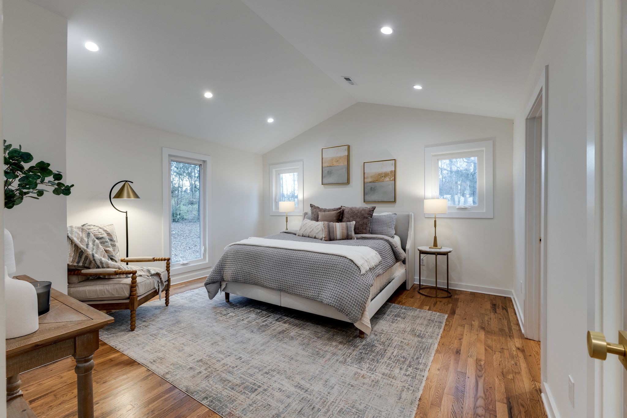 4342 Murfreesboro Road Franklin, TN 37067 - Photo 17 of 41 a bedroom with a bed and wooden floor