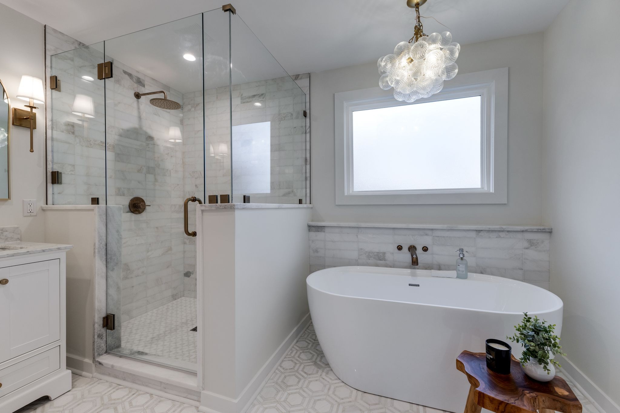 4342 Murfreesboro Road Franklin, TN 37067 - Photo 20 of 41 a white bath tub sitting next to a bathroom sink