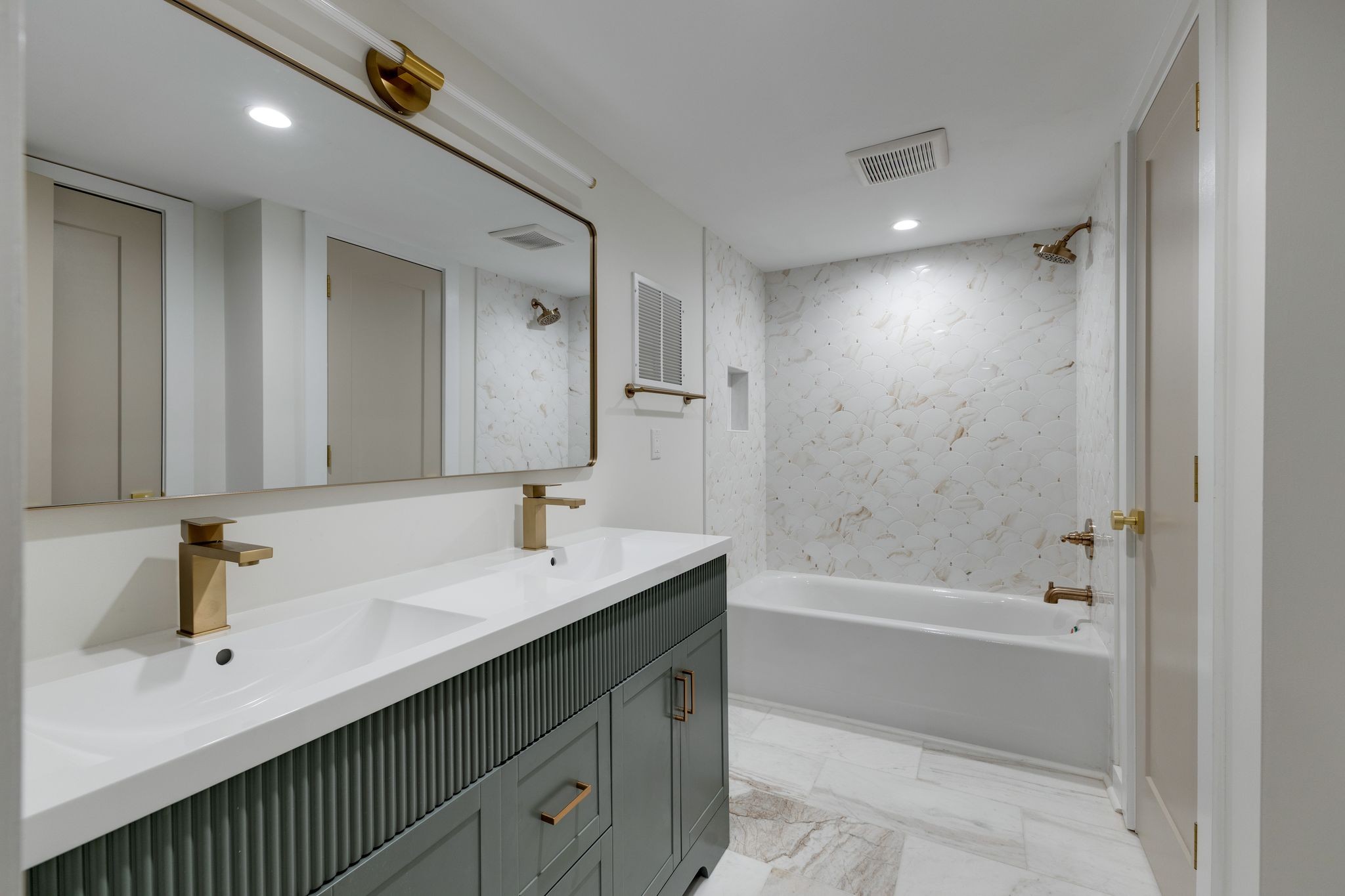 4342 Murfreesboro Road Franklin, TN 37067 - Photo 34 of 41 a bathroom with a bathtub shower sink double vanity and mirror