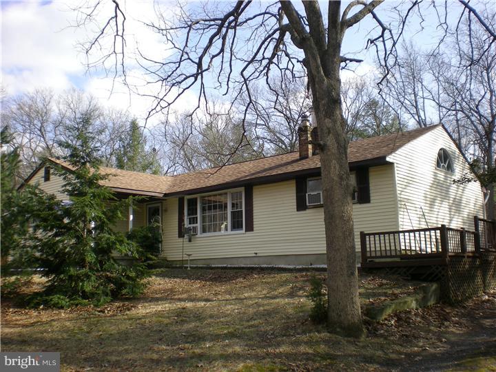 17 Center Road Pemberton, NJ 08068 - Photo 1 of 22 a front view of a house with a yard