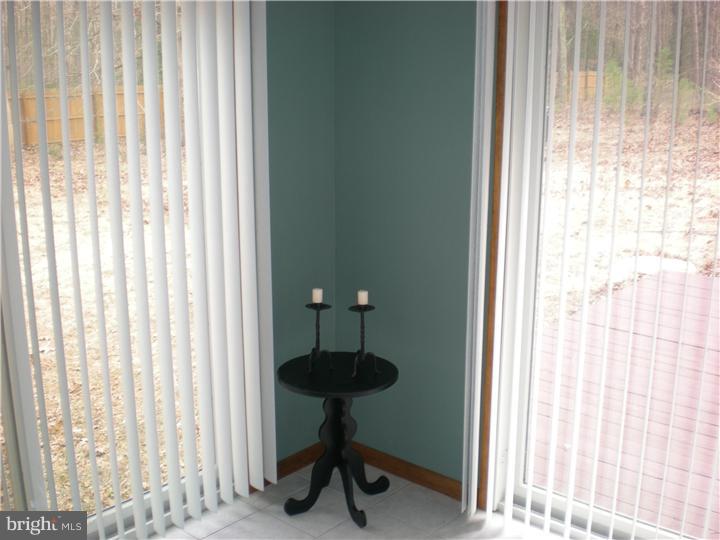 17 Center Road Pemberton, NJ 08068 - Photo 18 of 22 a kitchen with a sink and a window