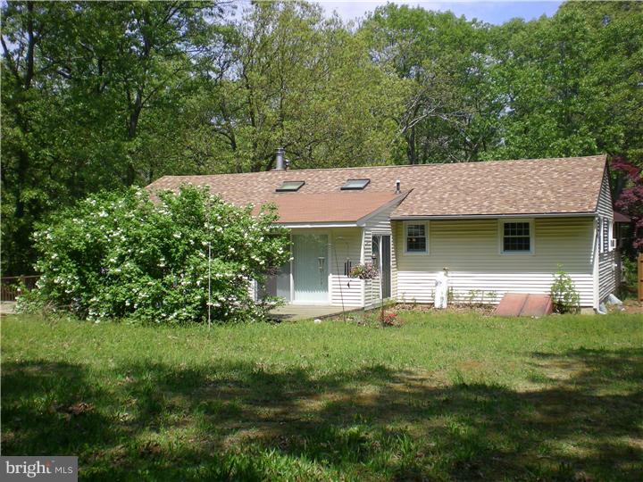17 Center Road Pemberton, NJ 08068 - Photo 22 of 22 a view of a house with pool and garden
