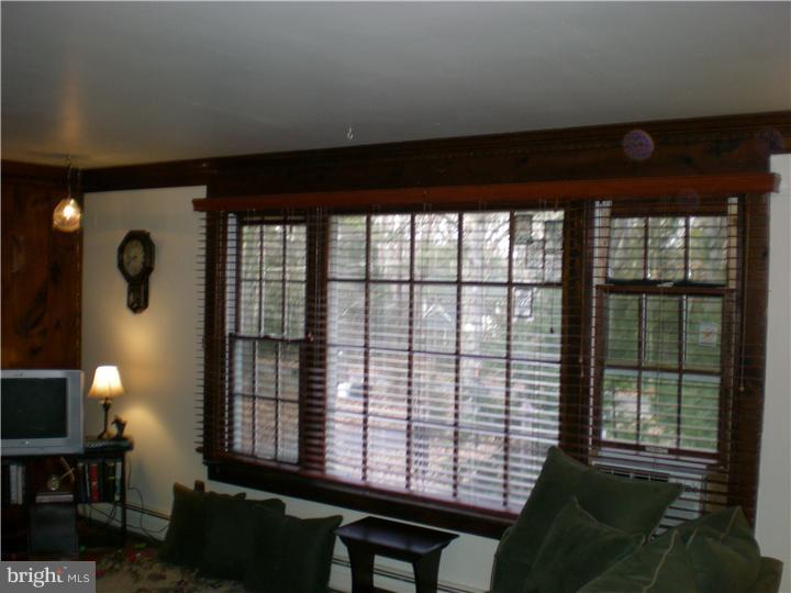17 Center Road Pemberton, NJ 08068 - Photo 4 of 22 a view of a room with a large window