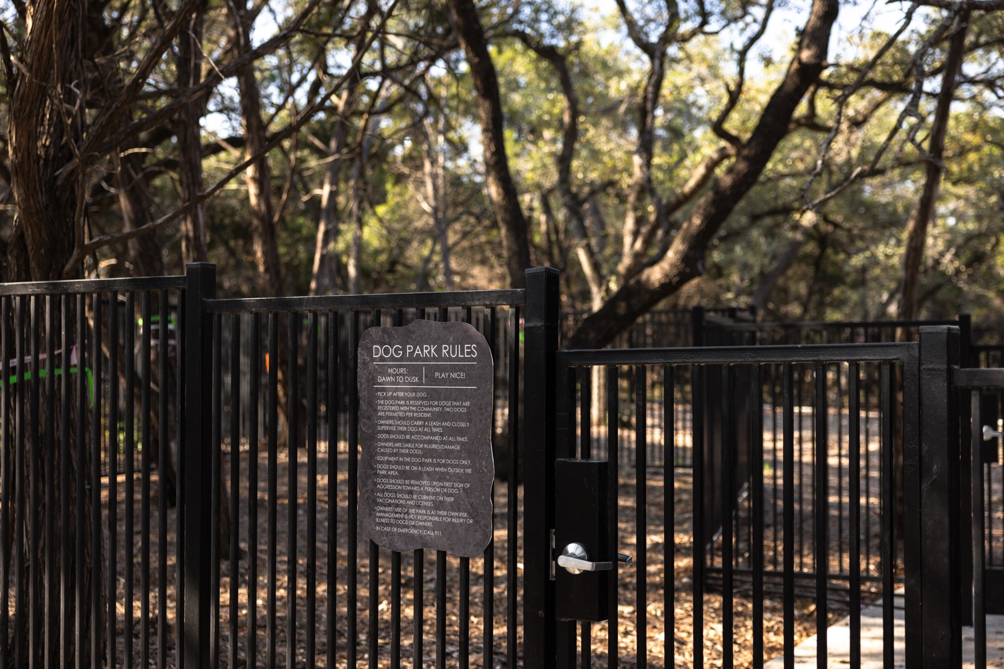 8107 Wilder Road Austin, TX 78736 - Photo 25 of 35 Securely fenced, this inviting dog park provides a dedicated area for canine enjoyment.