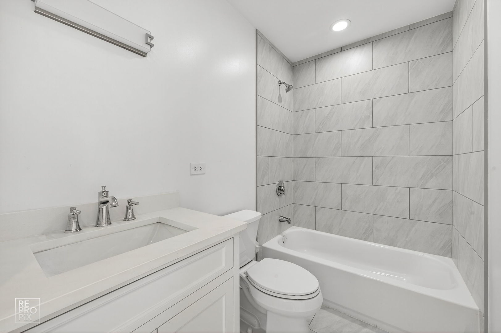1624 West Pershing Road Chicago, IL 60609 - Photo 11 of 28 a bathroom with a sink mirror toilet and bathtub