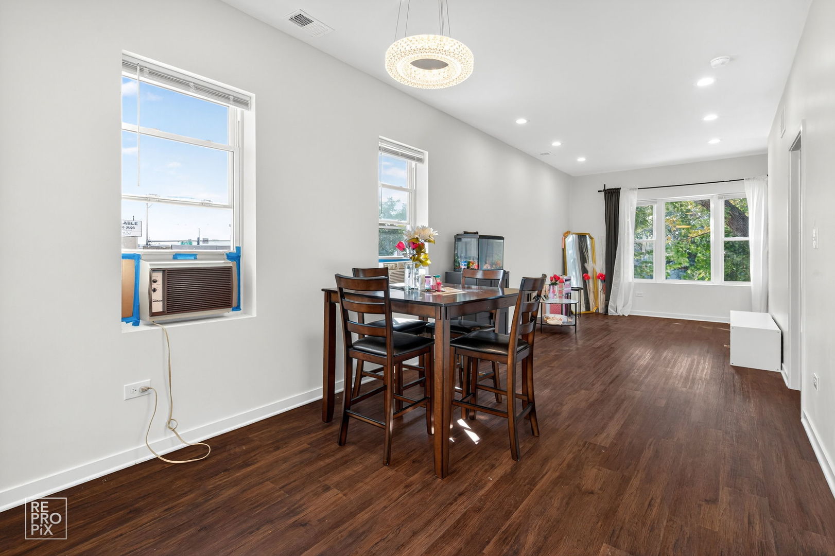1624 West Pershing Road Chicago, IL 60609 - Photo 15 of 28 a view of a dining room with furniture and wooden floor