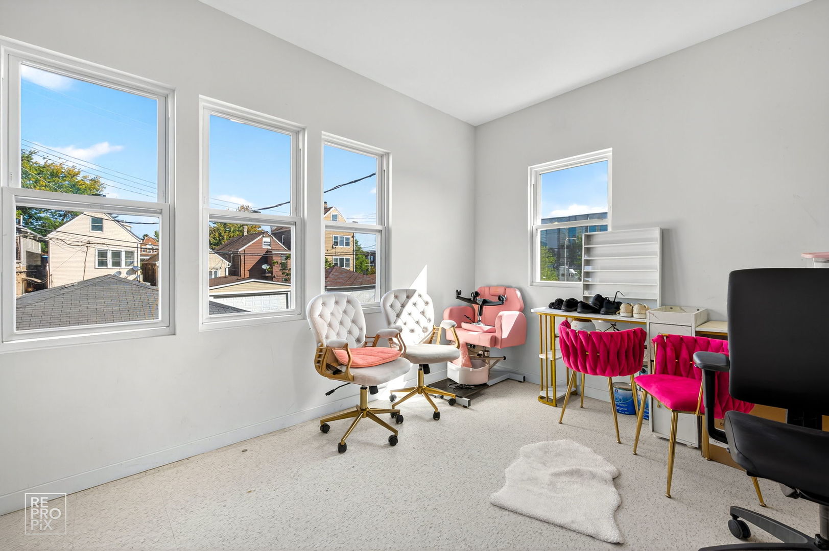 1624 West Pershing Road Chicago, IL 60609 - Photo 17 of 28 a living room with furniture and a floor to ceiling window