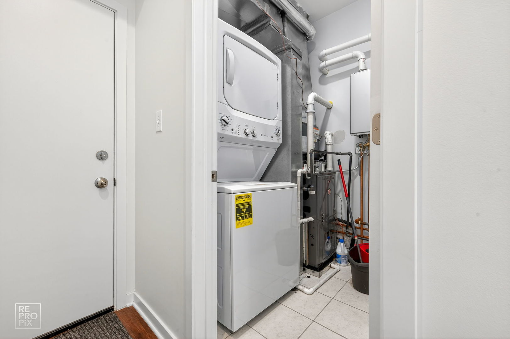 1624 West Pershing Road Chicago, IL 60609 - Photo 20 of 28 a view of walk in closet with clothes and shoes