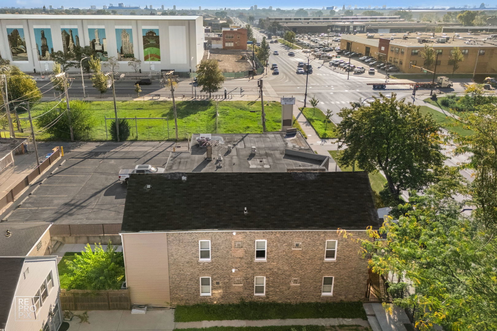 1624 West Pershing Road Chicago, IL 60609 - Photo 25 of 28 an aerial view of a house with a yard and lake view