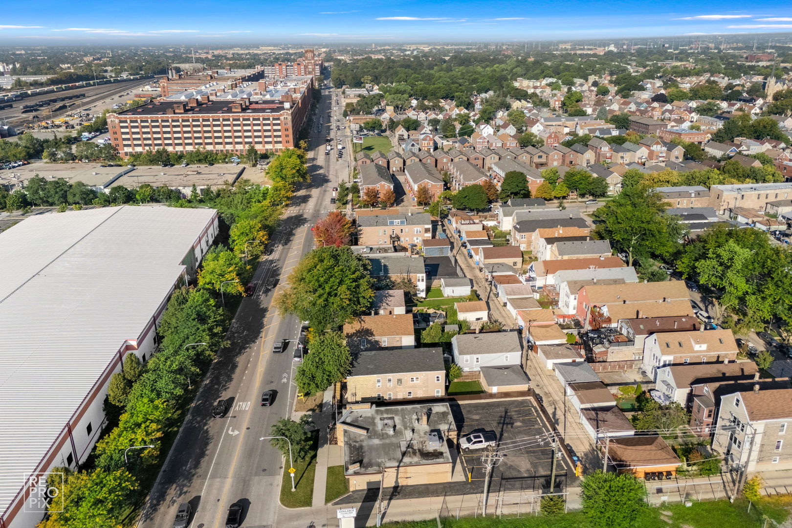 1624 West Pershing Road Chicago, IL 60609 - Photo 26 of 28 an aerial view of a city with lots of residential buildings