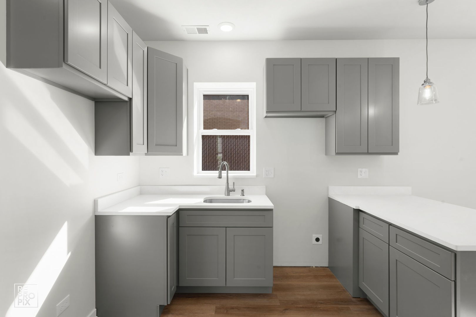 1624 West Pershing Road Chicago, IL 60609 - Photo 5 of 28 a bathroom with a sink and a mirror