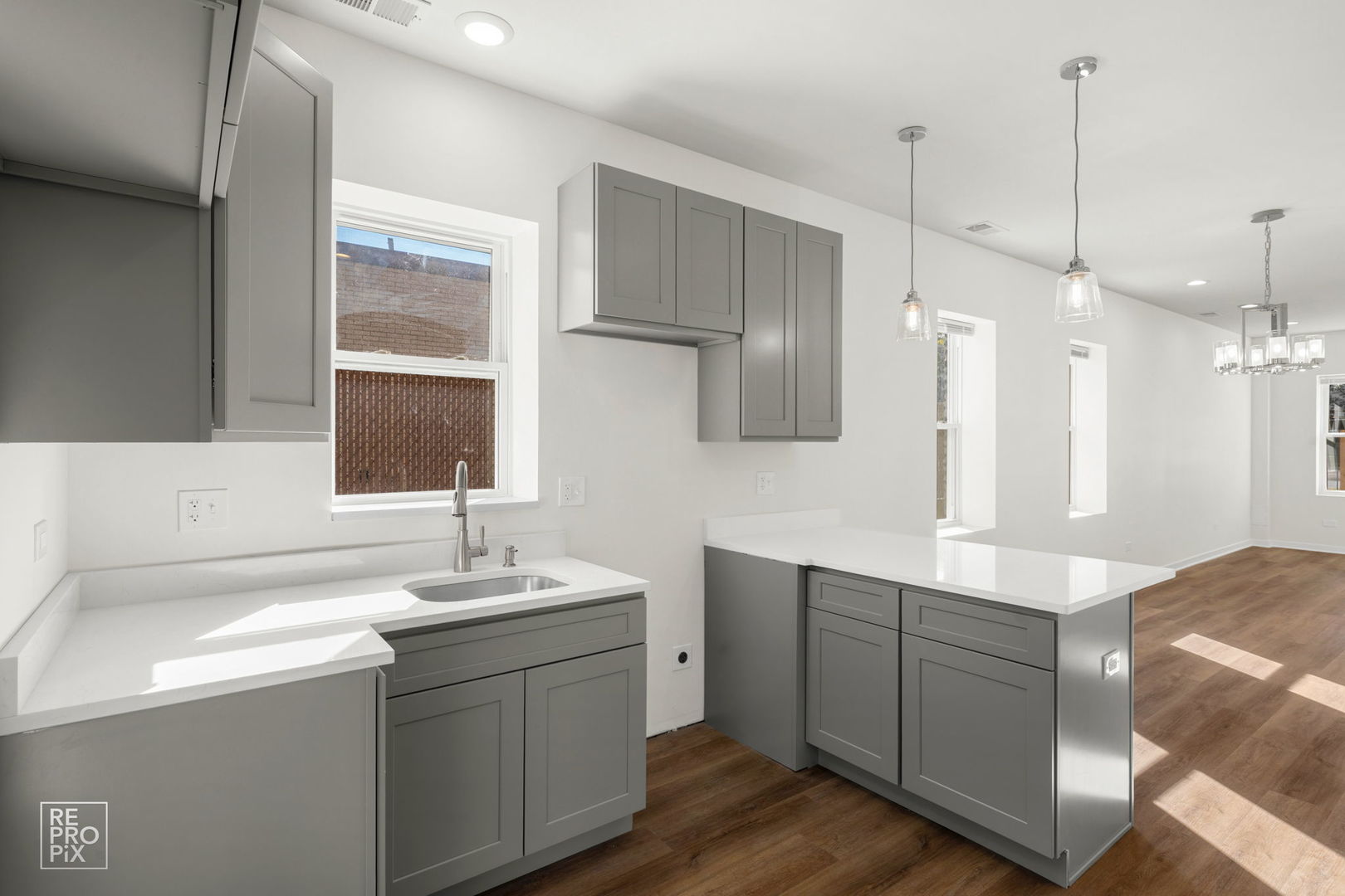 1624 West Pershing Road Chicago, IL 60609 - Photo 7 of 28 a bathroom with a double vanity sink and a mirror