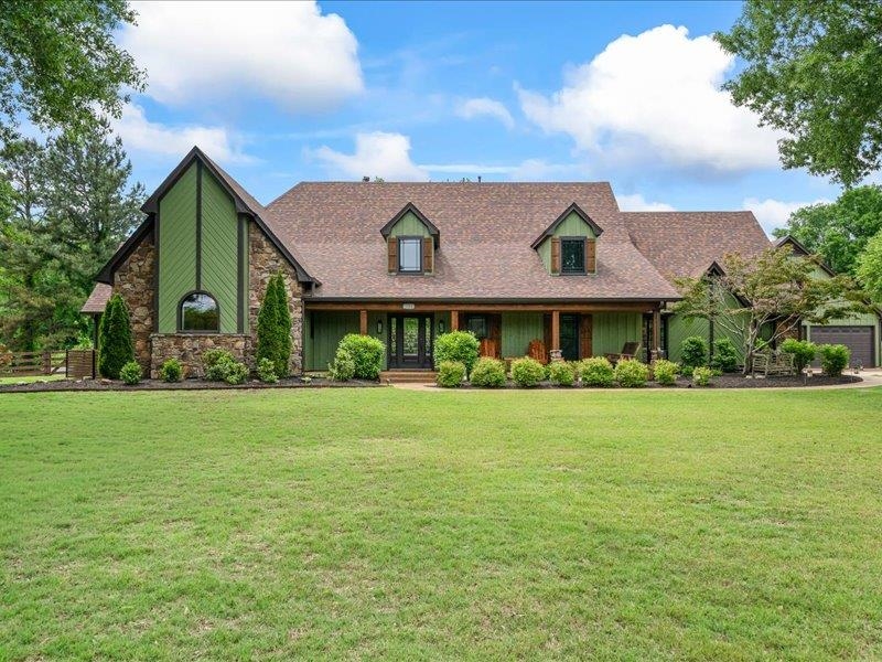 8104 Jack Bond Road Arlington, TN 38002 - Photo 2 of 40 a front view of a house with a garden