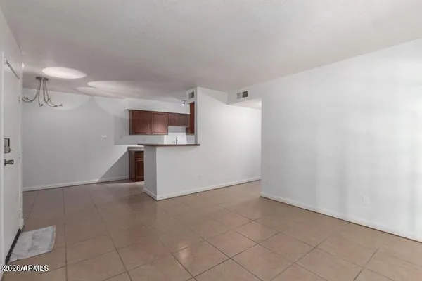 a view of a kitchen with a sink