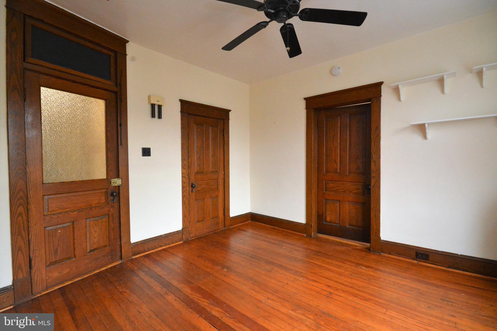 5 West Main Street, Unit 4 Middletown, MD 21769 - Photo 7 of 9 a view of empty room with wooden floor and fan