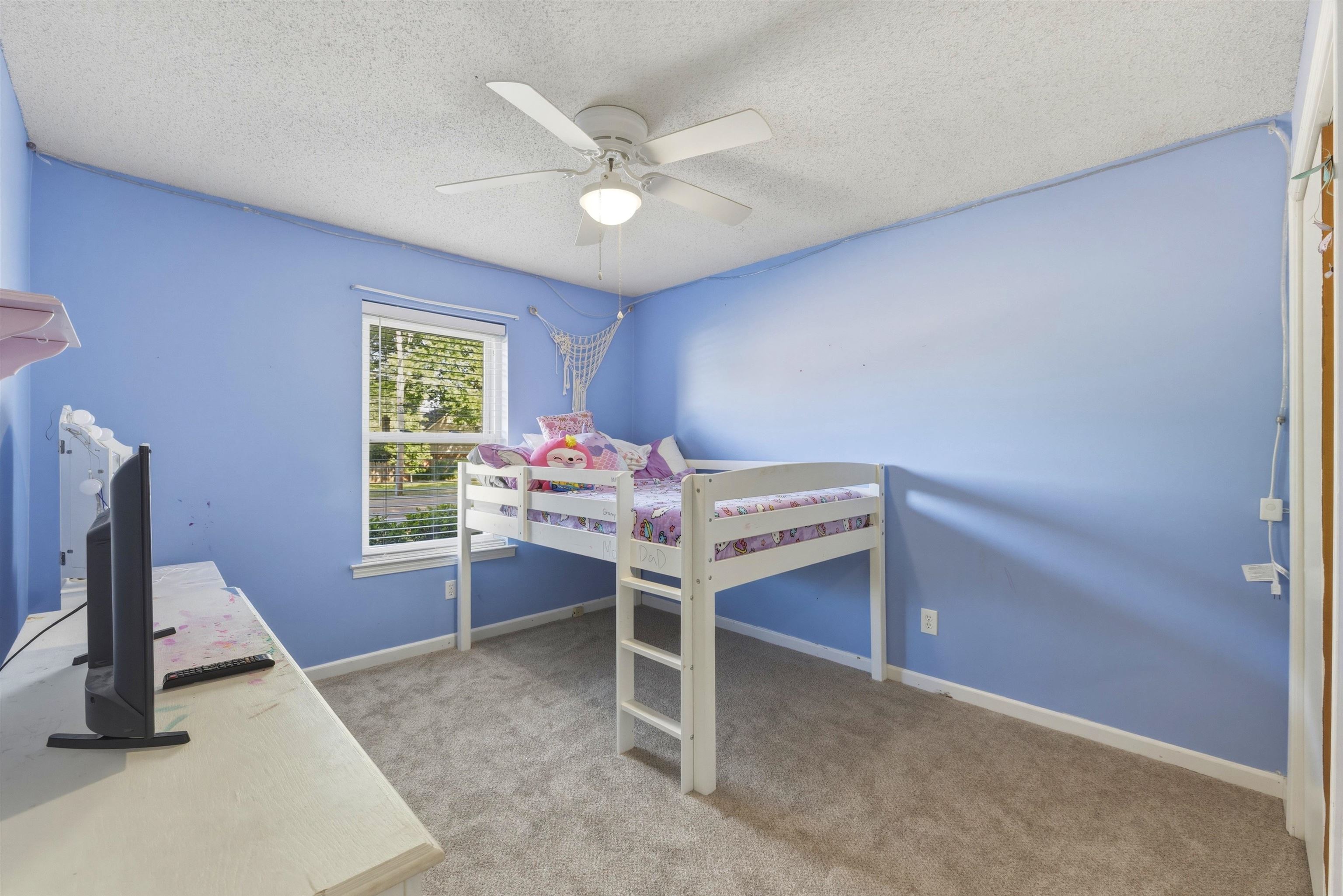 3276 Altruria Road Bartlett, TN 38134 - Photo 16 of 30 Carpeted room featuring a ceiling fan with integrated lighting, a window with blinds, and white trim