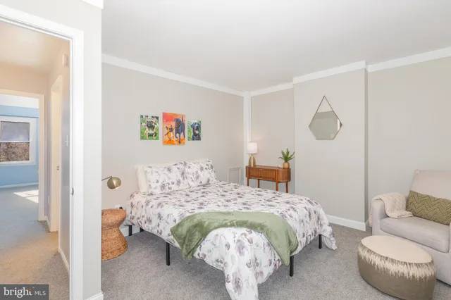 a bed room with a bed and a couch